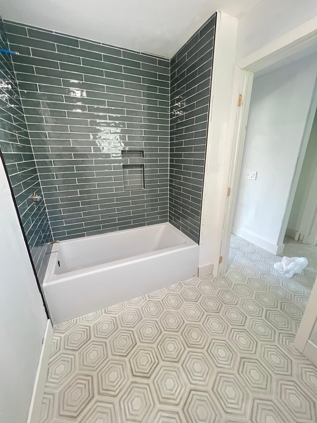 A beautifully designed living room in Port St. Lucie featuring elegant ceramic tile flooring from PSL Floor & Supply.