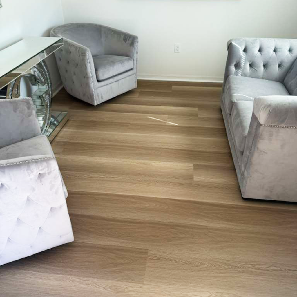 Waterproof Luxury Vinyl 8mm in Creme Brulle color installed in living room