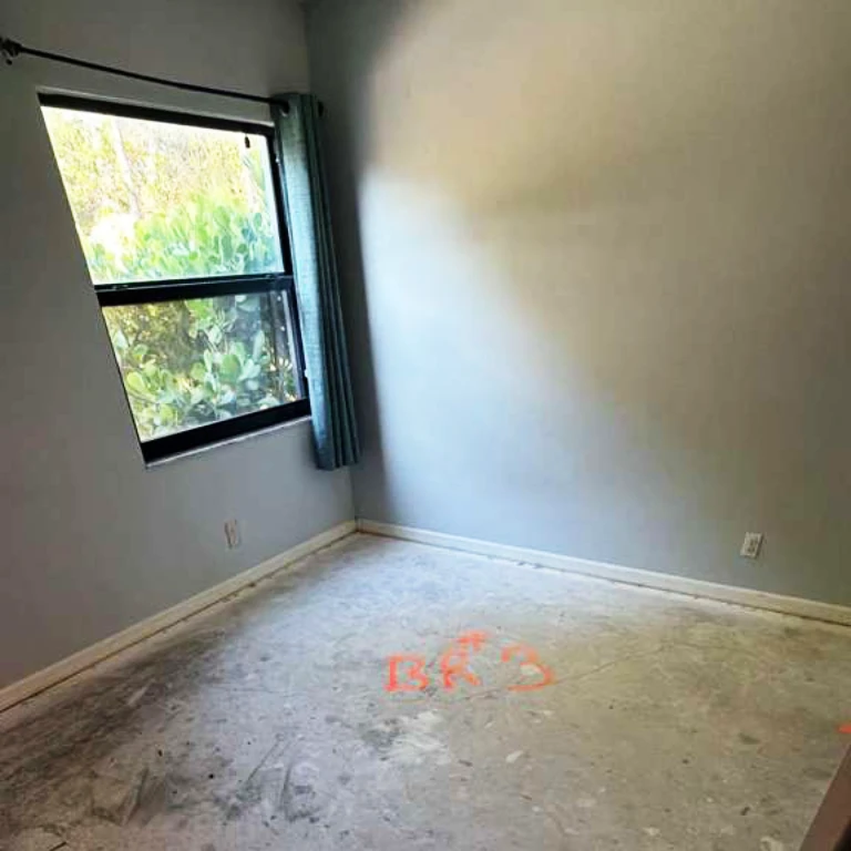 Before Flooring Installation — Bedroom 3 Subfloor | PSL Floor & Supply Bedroom subfloor before new flooring installation — Port St. Lucie home remodel by PSL Floor & Supply