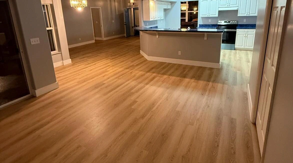Flooring installation in progress at a Port St. Lucie home — PSL Floor & Supply insured installation crew